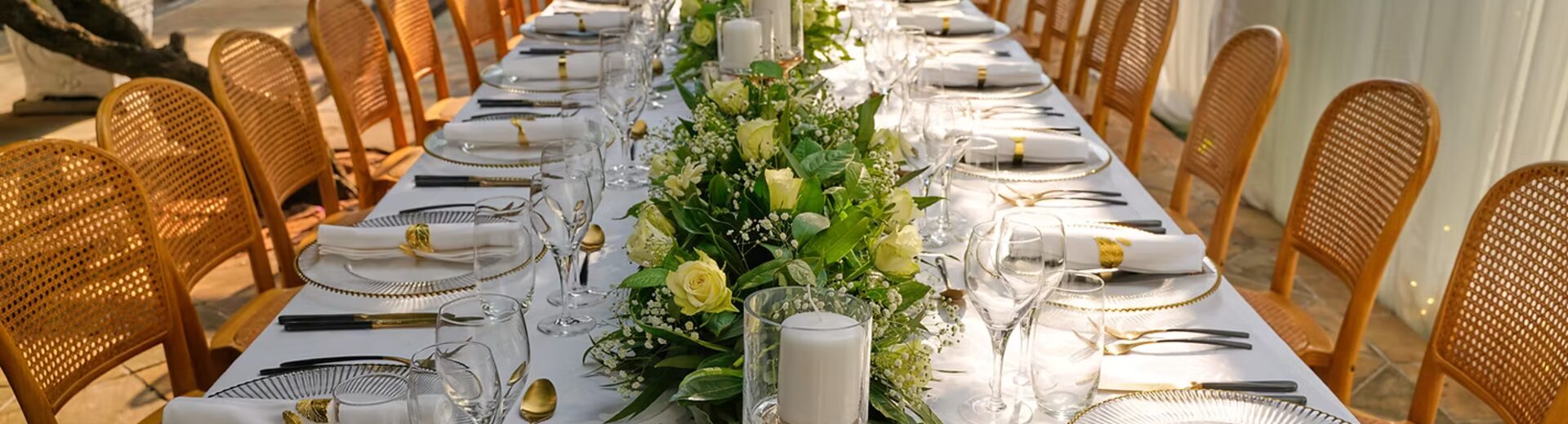 Long banquet table styled for a Luxelink Experiences event